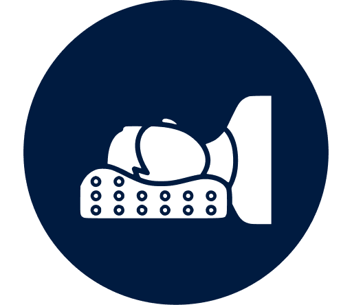Person sleeping on ergonomic pillow icon.