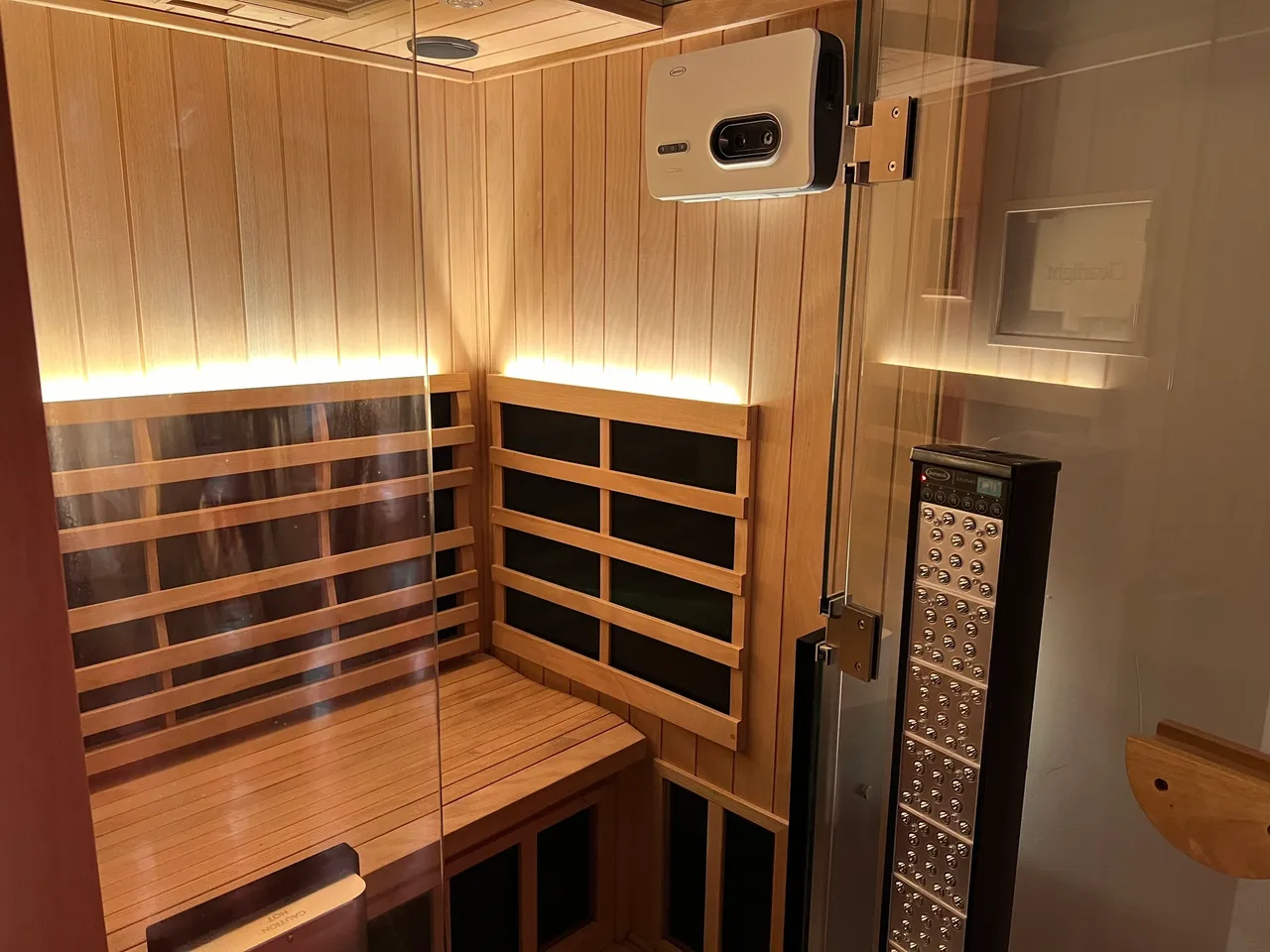 Modern infrared sauna interior with wooden benches
