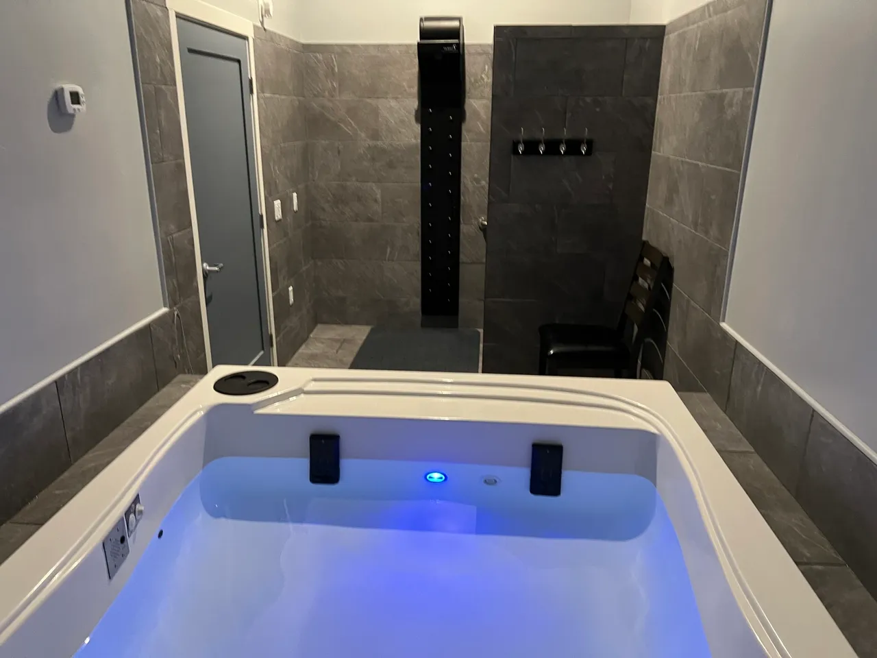 Indoor jacuzzi with blue LED lighting
